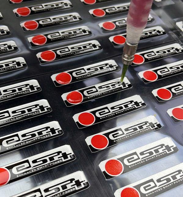 Giải Mã 4 Lớp Cấu Tạo Tem Nhựa Phủ Keo Epoxy: Bí Mật Đằng Sau Hiệu Ứng 3D Siêu Bền 14 Cau Tao Tem Nhua Phu Keo Epoxy 12 Giải Mã 4 Lớp Cấu Tạo Tem Nhựa Phủ Keo Epoxy: Bí Mật Đằng Sau Hiệu Ứng 3D Siêu Bền | In Đồng Lợi | 14